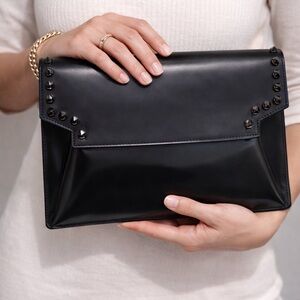 Authentic MCM black leather Studded Clutch w/ certificate and duster
